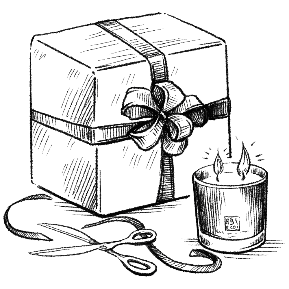 A gift wrapped box and BB Boutique Candle